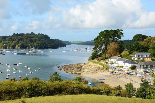 beautiful view across helford passage with boats moored